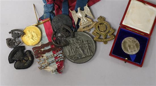 A quantity of mixed military medals and badges